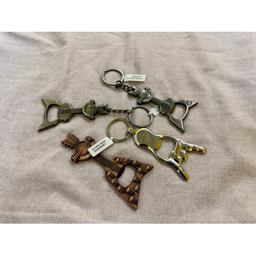 312 - A Selection of Original  Keyrings & a Bottle Opener Fridge Magnet from the Hard Rock Cafe London. 

... 