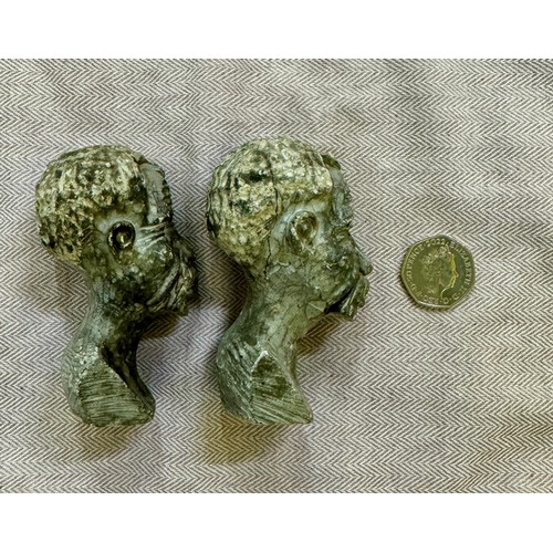 318 - A pair of African carved soap stone busts.

This lot is available for in-house shipping.