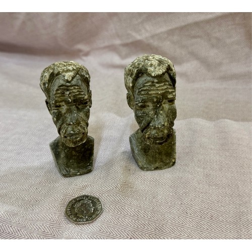 318 - A pair of African carved soap stone busts.

This lot is available for in-house shipping.