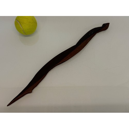 196 - Australian, Aboriginal tribal art, a hand carved serpent 42 cm long.

This lot is available for in-h... 