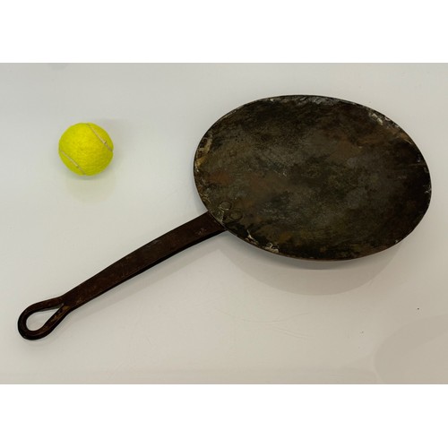 21 - Kitchenalia, a large copper and wrought iron pan lid, 31 cm  diameter x 56.5 cm long.

This lot is a... 