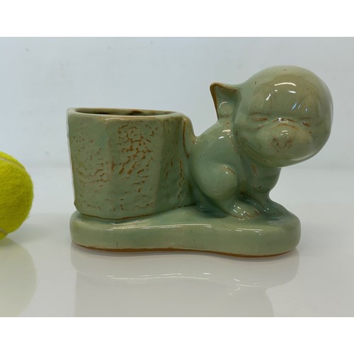 19 - Art Deco stoneware desk stand by Burton Pottery, features a Bonzo Dog figure, 18 cm x 12 cm.

This l... 