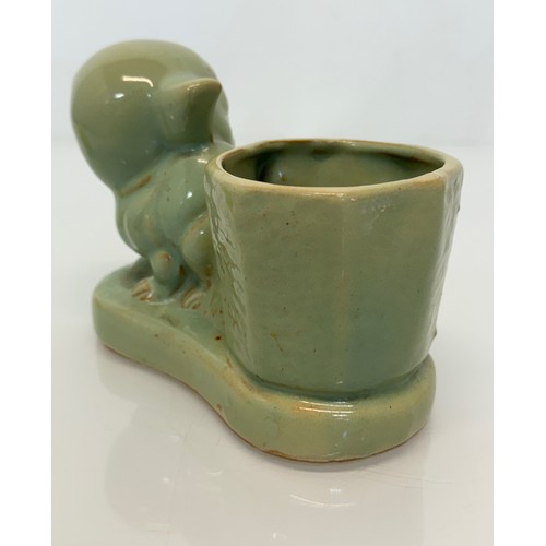 19 - Art Deco stoneware desk stand by Burton Pottery, features a Bonzo Dog figure, 18 cm x 12 cm.

This l... 