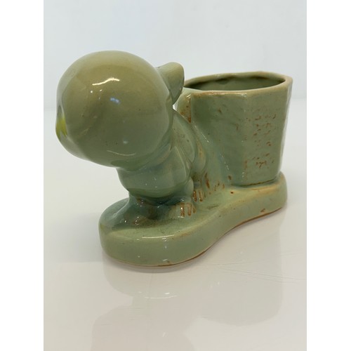 19 - Art Deco stoneware desk stand by Burton Pottery, features a Bonzo Dog figure, 18 cm x 12 cm.

This l... 