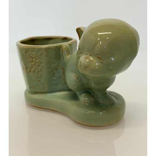 19 - Art Deco stoneware desk stand by Burton Pottery, features a Bonzo Dog figure, 18 cm x 12 cm.

This l... 