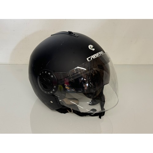 225 - Motorcycle helmet by Caberg with two full down visors.

This lot is available for in-house shipping