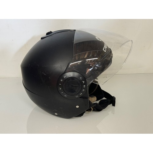 225 - Motorcycle helmet by Caberg with two full down visors.

This lot is available for in-house shipping