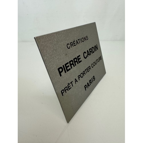 238 - Shop display, an Advertising sign for Pierre Cardin fashions and perfumes, 20 cm x 16 cm.

This lot ... 