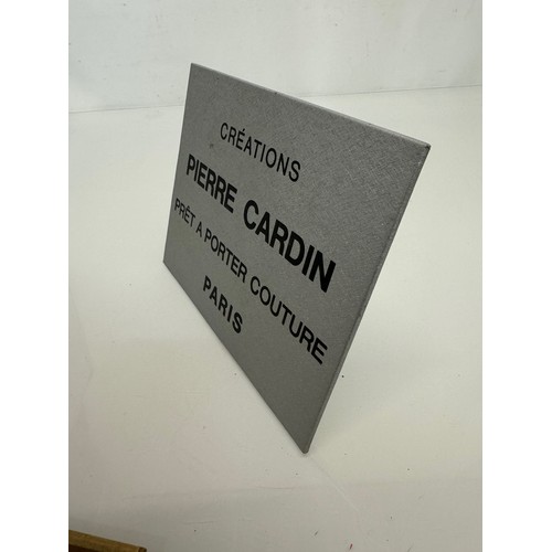 238 - Shop display, an Advertising sign for Pierre Cardin fashions and perfumes, 20 cm x 16 cm.

This lot ... 