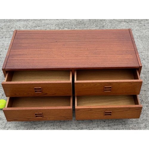 5 - Mid Century Danish furniture, a teak four drawer storage unit, 88 cm x 42 cm x 38 cm tall.

This lot... 