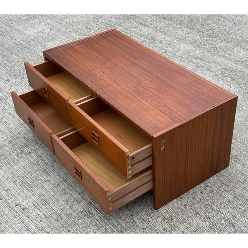 5 - Mid Century Danish furniture, a teak four drawer storage unit, 88 cm x 42 cm x 38 cm tall.

This lot... 