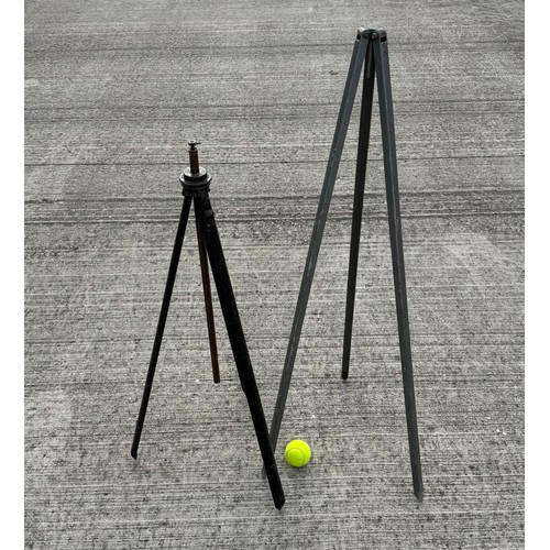 76 - Two metal tripod stands, for cameras or scientific equipment. 104 cm and 88 cm tall respectfully.

T... 