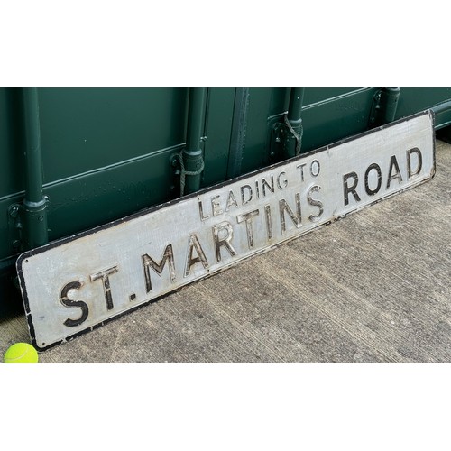 159 - A large vintage pressed aluminium road sign, St Martins Road, 145 cm x 23 cm.

This lot is available... 