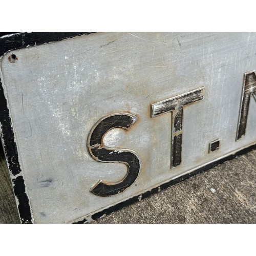 159 - A large vintage pressed aluminium road sign, St Martins Road, 145 cm x 23 cm.

This lot is available... 