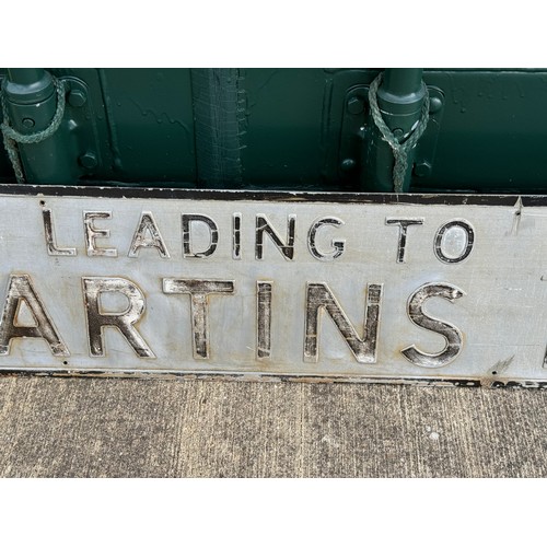 159 - A large vintage pressed aluminium road sign, St Martins Road, 145 cm x 23 cm.

This lot is available... 