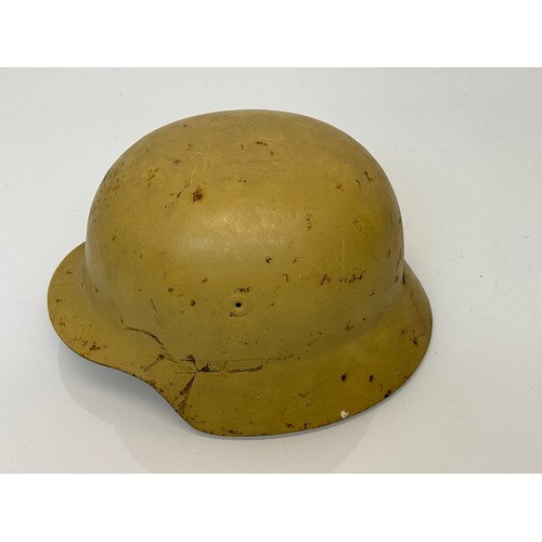 106 - German army WWII era steel helmet, with liner ertc.

This lot is available for in-house shipping

Th... 