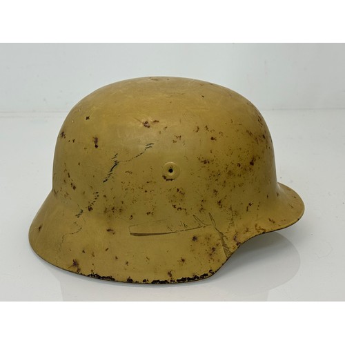 106 - German army WWII era steel helmet, with liner ertc.

This lot is available for in-house shipping

Th... 