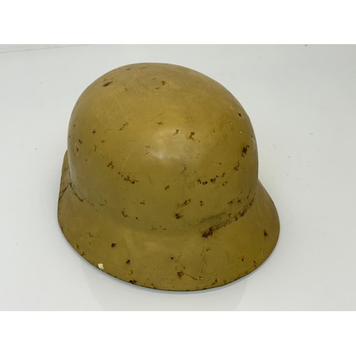 106 - German army WWII era steel helmet, with liner ertc.

This lot is available for in-house shipping

Th... 