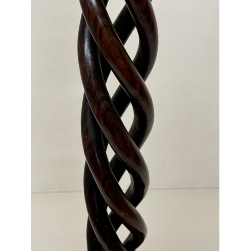 162 - Carved hardwood lamp base 148 cm high, 35 cm diameter base.

This lot is available for in-house ship... 