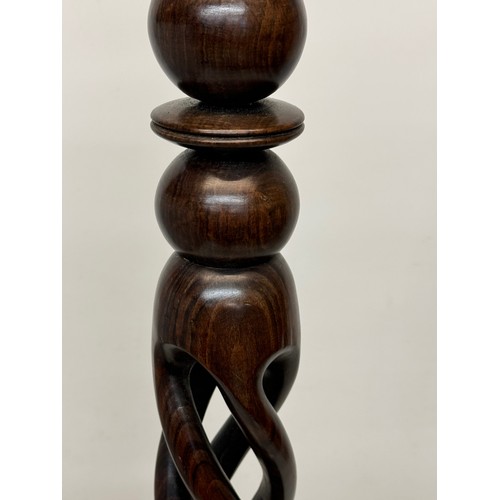 162 - Carved hardwood lamp base 148 cm high, 35 cm diameter base.

This lot is available for in-house ship... 