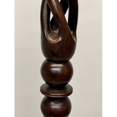 162 - Carved hardwood lamp base 148 cm high, 35 cm diameter base.

This lot is available for in-house ship... 