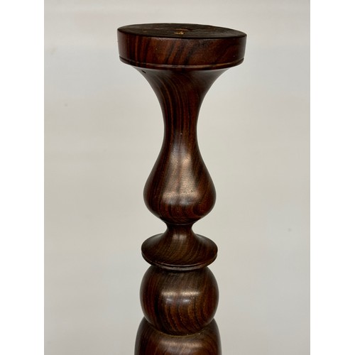 162 - Carved hardwood lamp base 148 cm high, 35 cm diameter base.

This lot is available for in-house ship... 