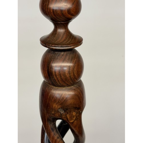 162 - Carved hardwood lamp base 148 cm high, 35 cm diameter base.

This lot is available for in-house ship... 