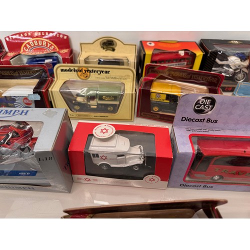 170 - Diecast toys, a collection of loose and boxed promotional vechiles motorcycles cars and trucks.

Thi... 