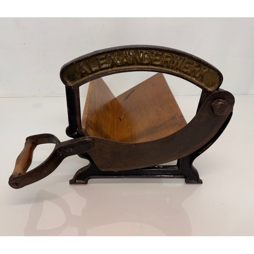 176 - Kitchenalia, early C19th century bread cutter.

This lot is available for in-house shipping