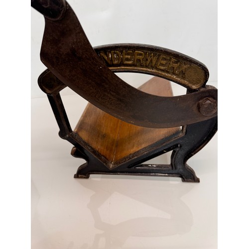 176 - Kitchenalia, early C19th century bread cutter.

This lot is available for in-house shipping