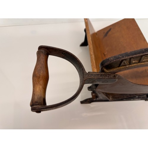 176 - Kitchenalia, early C19th century bread cutter.

This lot is available for in-house shipping