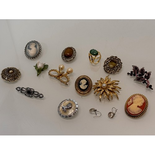 183 - A collection of costume jewellery, cameo broach etc.

This lot is available for in-house shipping