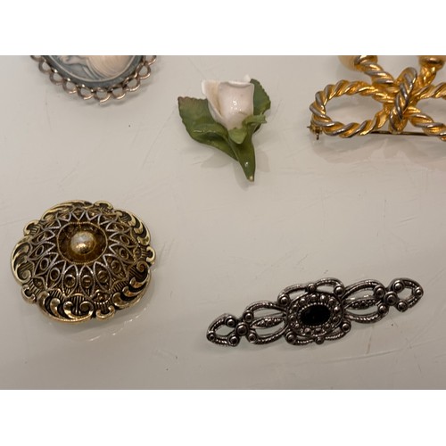 183 - A collection of costume jewellery, cameo broach etc.

This lot is available for in-house shipping