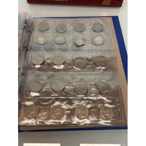 184 - Coins, a collection in two albums of British coins.

This lot is available for in-house shipping