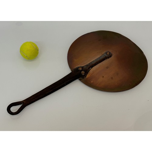 330 - Kitchenalia, a large copper and wrought iron pan lid, 31 cm  diameter x 56.5 cm long.

This lot is a... 