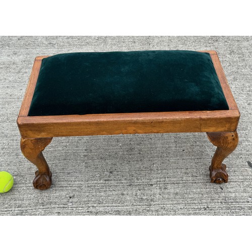 181 - Footstool with ball and claw feet and green velvet upholstery, 62 cm x 35 cm x 29 cm tall.

This lot... 