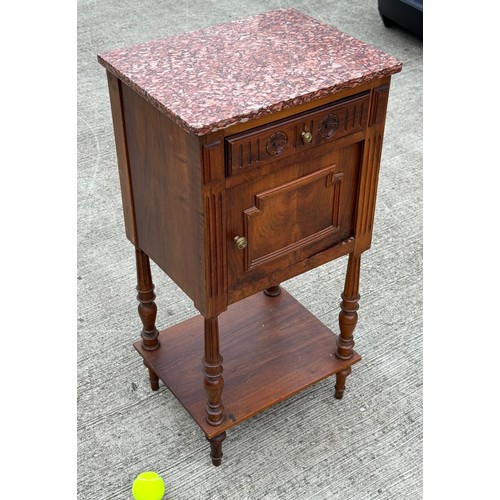 179 - French country furniture, a marble topped walnut bedside cupboard on raised legs, with an undershelf... 