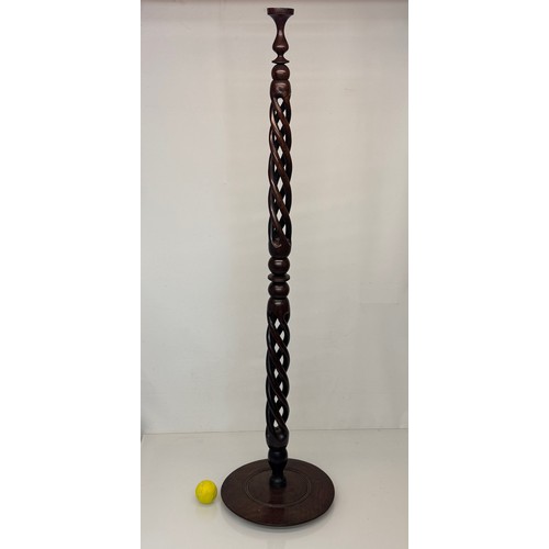 174 - Carved hardwood lamp base 148 cm high, 35 cm diameter base.

This lot is available for in-house ship... 