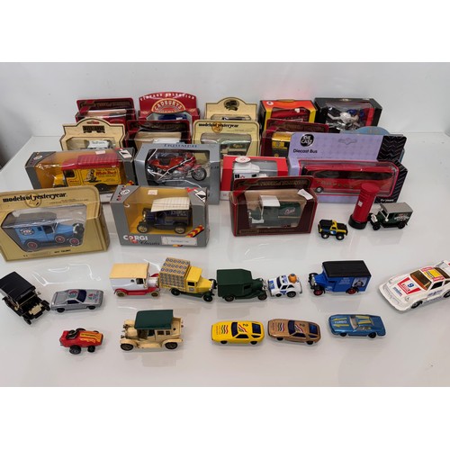 383 - Diecast toys, a collection of loose and boxed promotional vechiles motorcycles cars and trucks.

Thi... 