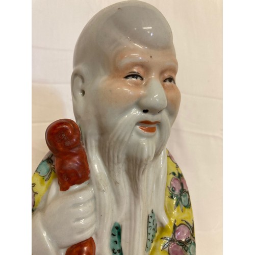 143 - Chinese ceramics, a famile rose figure of Shou Lao God of Longevity 16 inches high

Collection only,... 