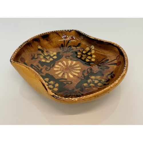 126 - Stoneware art pottery bowl with slip decoration, 25.5 cm x 21.5 cm.

This lot is available for in-ho... 