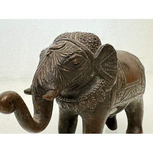 119 - Cast bronze figure of an Indian bull elephant, 13 cm long.

This lot is available for in-house shipp... 