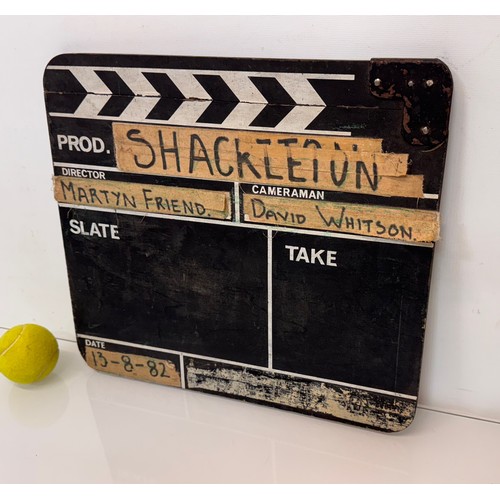 27 - Movie ,Film memorabilia, a vintage wooden clapper board , marked for the TV series Shackleton and da... 