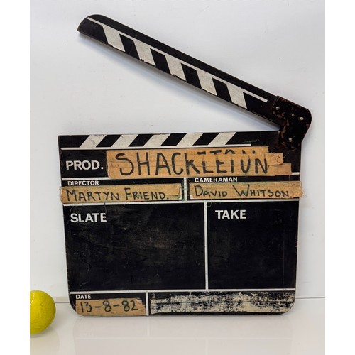 27 - Movie ,Film memorabilia, a vintage wooden clapper board , marked for the TV series Shackleton and da... 