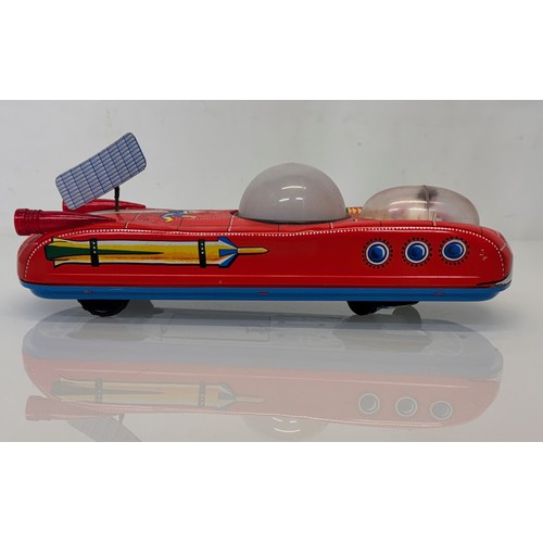 50 - Tinplate Space car toy, vintage battery powered childrens toy, 33 cm long.
This lot is available for... 