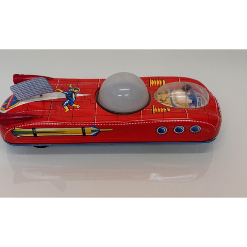 50 - Tinplate Space car toy, vintage battery powered childrens toy, 33 cm long.
This lot is available for... 