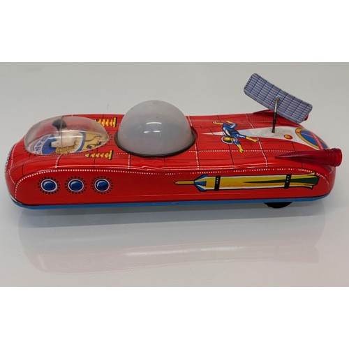 50 - Tinplate Space car toy, vintage battery powered childrens toy, 33 cm long.
This lot is available for... 