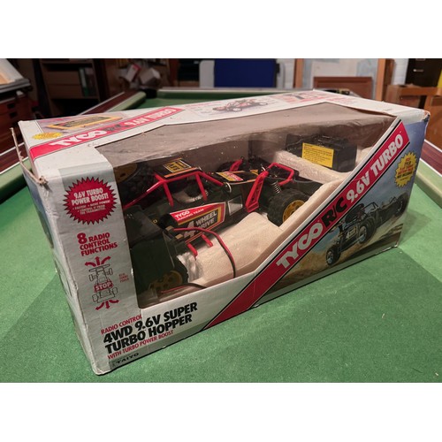 62 - Radio Control 4WD Tyco Racing Car, boxed. 52 cm x 24 cm x 23 cm.

This lot is available for in-house... 