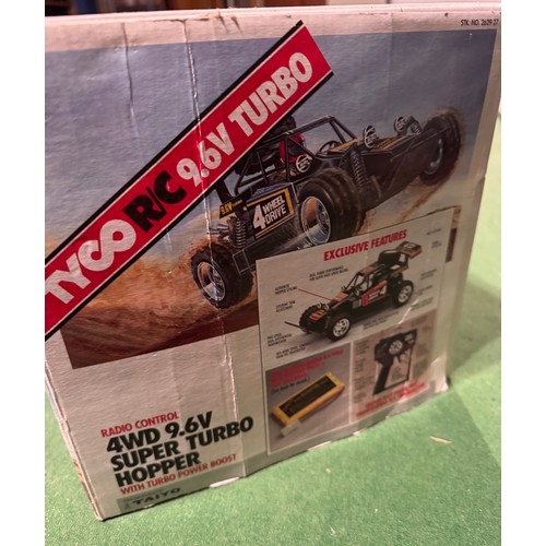 62 - Radio Control 4WD Tyco Racing Car, boxed. 52 cm x 24 cm x 23 cm.

This lot is available for in-house... 