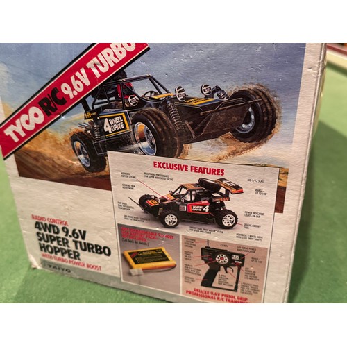 62 - Radio Control 4WD Tyco Racing Car, boxed. 52 cm x 24 cm x 23 cm.

This lot is available for in-house... 